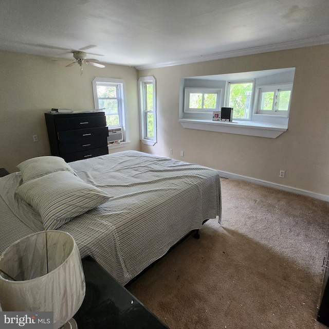 bedroom featuring carpet floors, crown molding, ceiling fan, and cooling unit