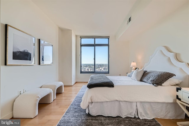 bedroom featuring light hardwood / wood-style flooring