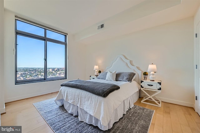 bedroom featuring light hardwood / wood-style flooring