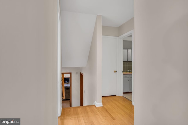 hallway featuring light hardwood / wood-style flooring