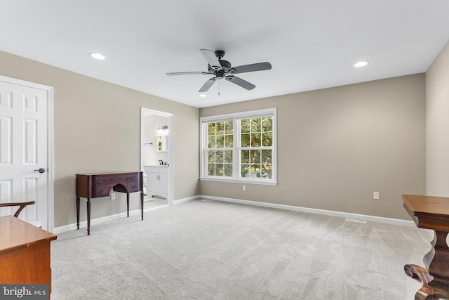 interior space with ceiling fan