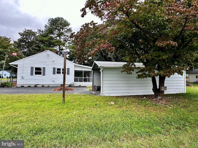 1315 Lexington St, Salisbury, MD 21804 - back of house with a sunroom and a yard