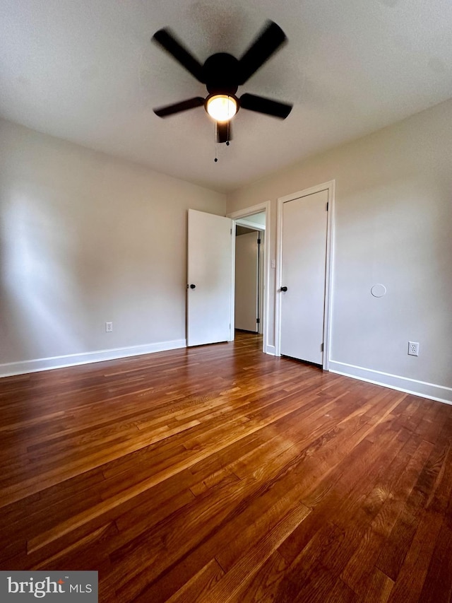 1315 Lexington St, Salisbury, MD 21804 - unfurnished bedroom featuring a ceiling fan, baseboards, and dark wood finished floors