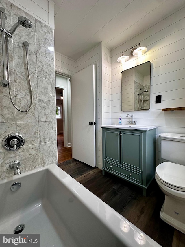 1315 Lexington St, Salisbury, MD 21804 - full bathroom featuring toilet, vanity, shower / bath combination, and wood finished floors