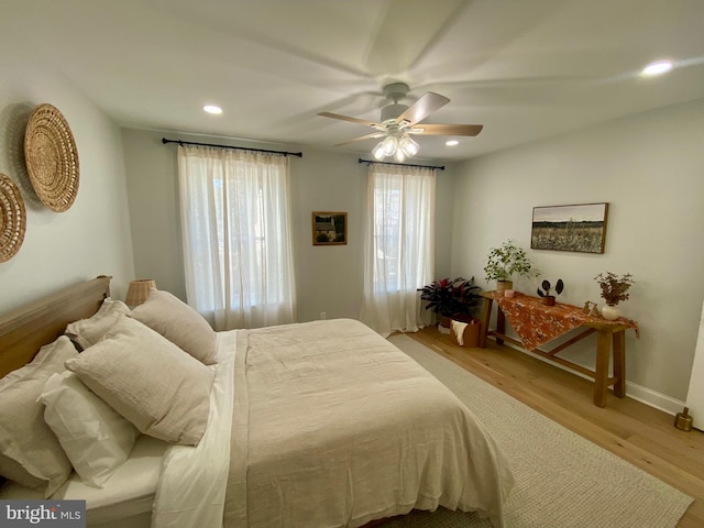 bedroom featuring ceiling fan and light wood-type flooring