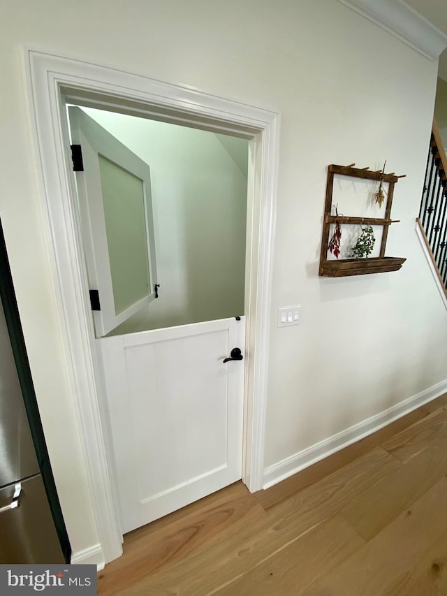 hall featuring light hardwood / wood-style flooring