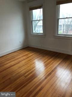 spare room with light wood-type flooring