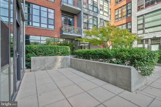 view of patio / terrace with a balcony