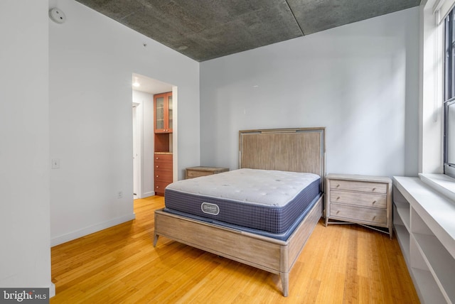 bedroom featuring light hardwood / wood-style floors