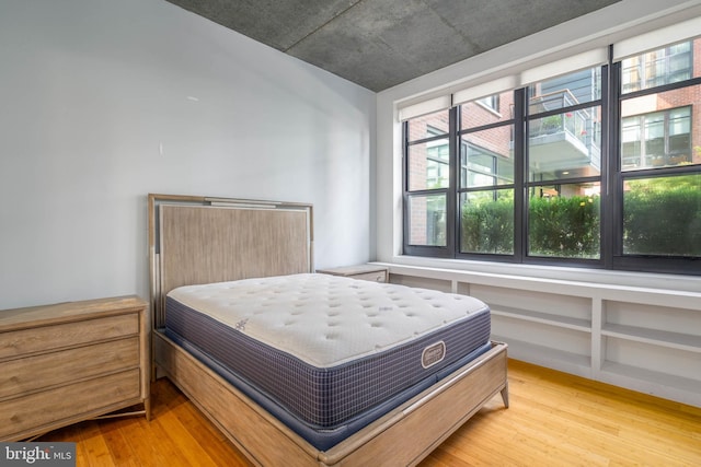 bedroom featuring light wood-type flooring