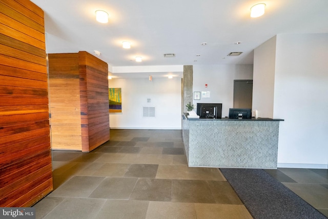 welcome area featuring a wood stove