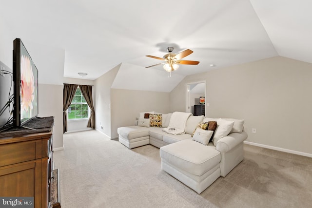 carpeted living room with lofted ceiling and ceiling fan