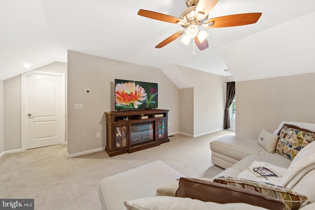 carpeted living room featuring lofted ceiling and ceiling fan