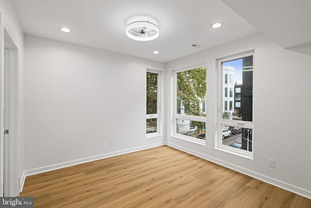 empty room with light wood-type flooring