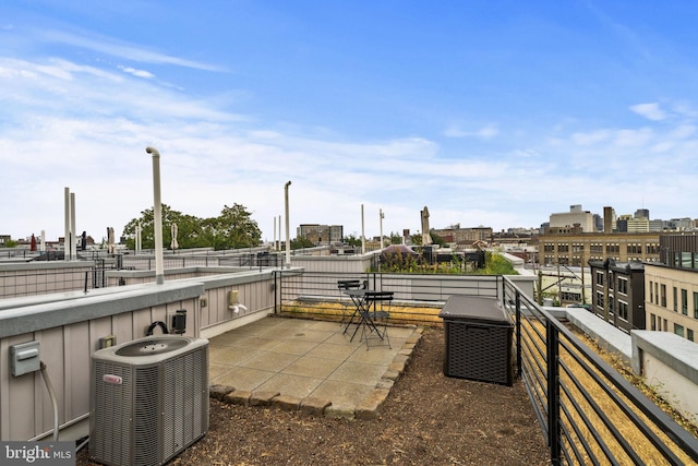 view of patio featuring a balcony and cooling unit