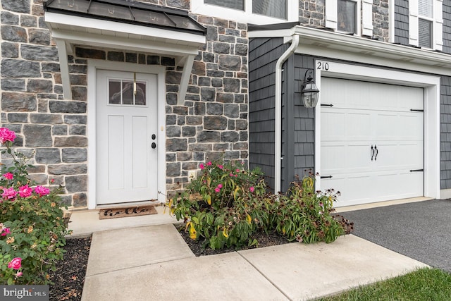 property entrance featuring a garage