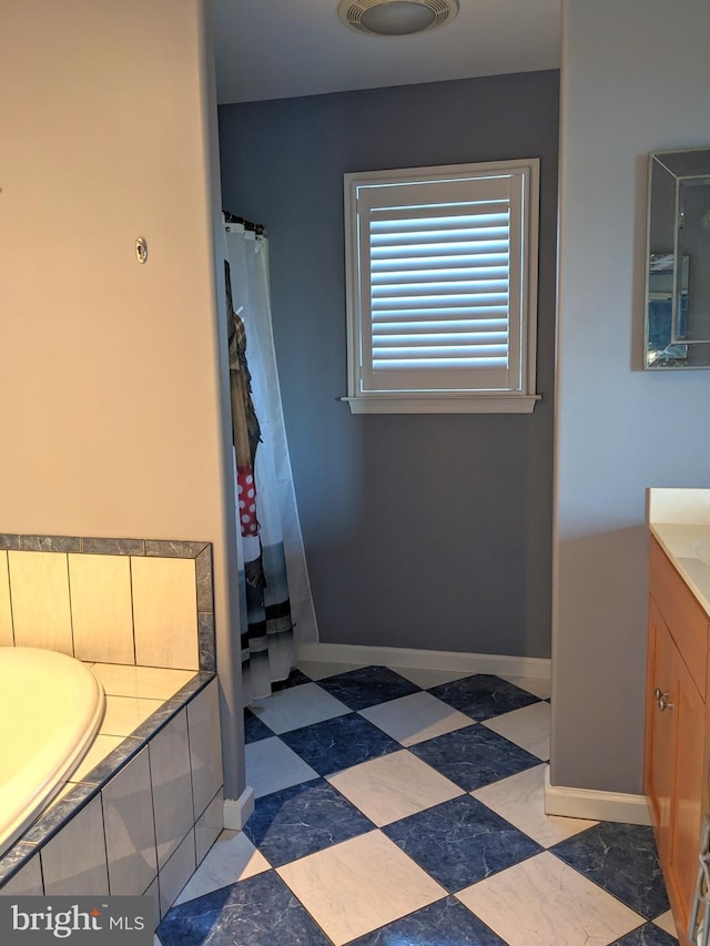 bathroom with vanity and plus walk in shower