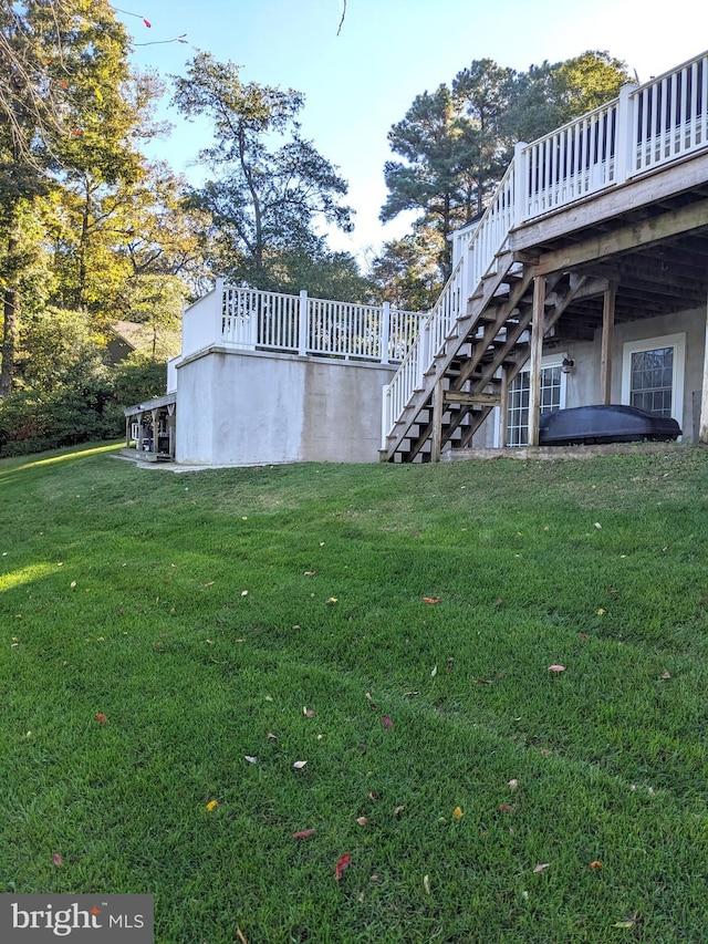 view of yard with a deck