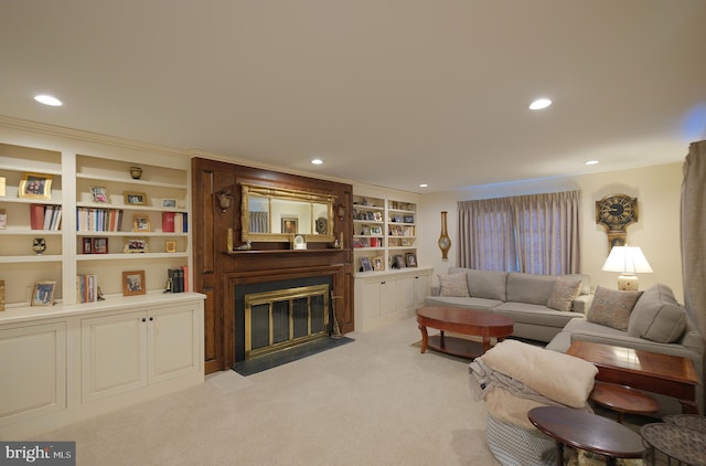 carpeted living room with built in shelves