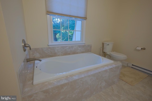 bathroom with tiled tub and toilet