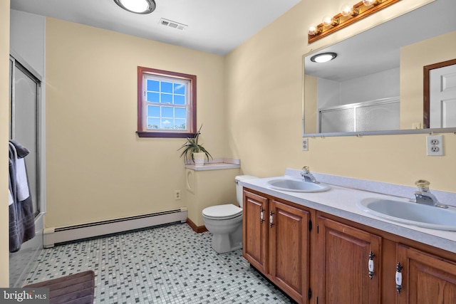 bathroom featuring vanity, a baseboard radiator, toilet, and a shower with door