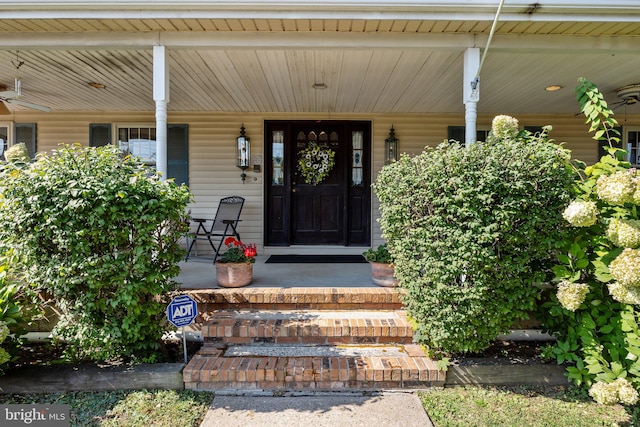 doorway to property featuring covered porch