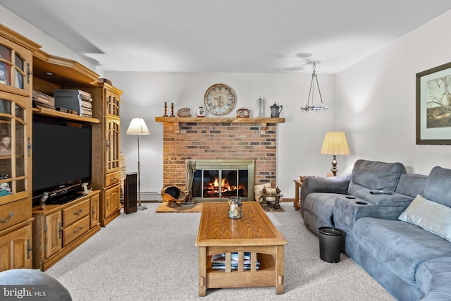 living room featuring a brick fireplace, a baseboard radiator, and light carpet