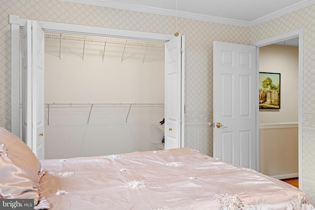 bedroom with ornamental molding