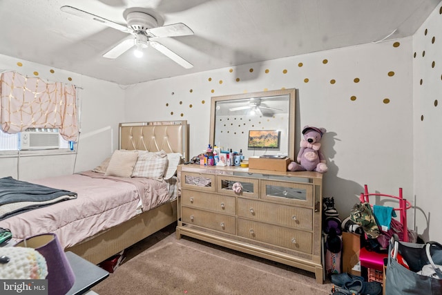 carpeted bedroom featuring ceiling fan and cooling unit