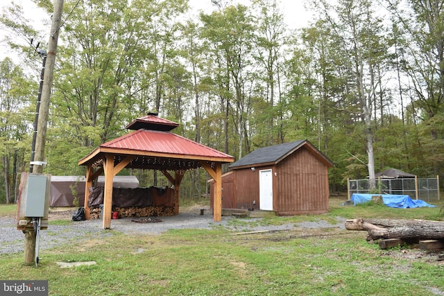 view of yard with a shed and a gazebo