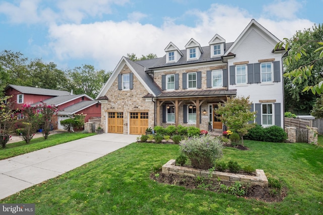 view of front of home featuring a front lawn and a garage