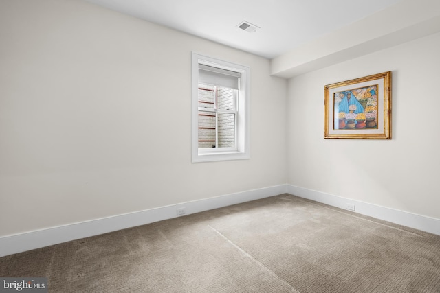 empty room with carpet flooring