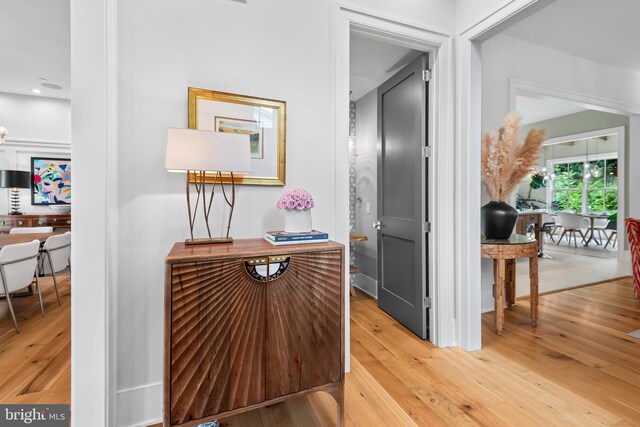 hallway featuring light hardwood / wood-style flooring