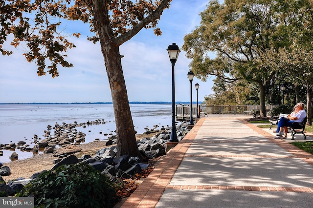 view of home's community featuring a water view
