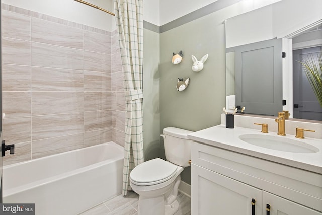 full bathroom featuring vanity, toilet, and shower / tub combo with curtain