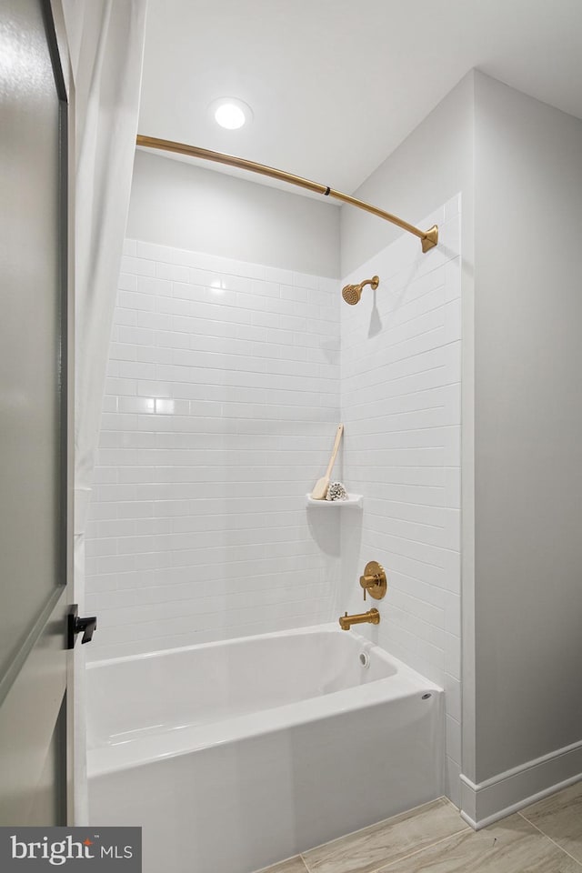 bathroom featuring  shower combination
