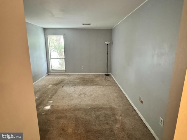 view of carpeted spare room