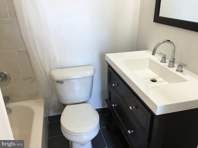 full bathroom featuring shower / bath combination with curtain, vanity, toilet, and tile patterned floors