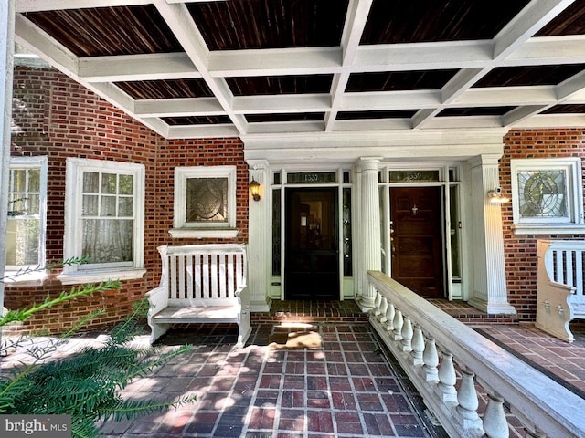 property entrance featuring covered porch