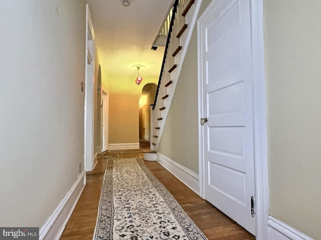 hall with wood-type flooring