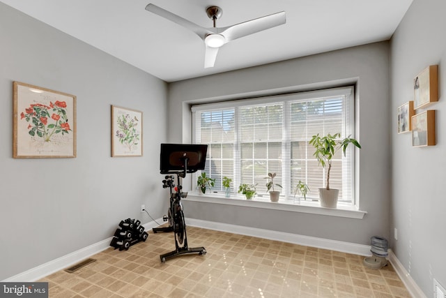 workout room with ceiling fan