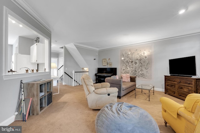 carpeted living room featuring crown molding