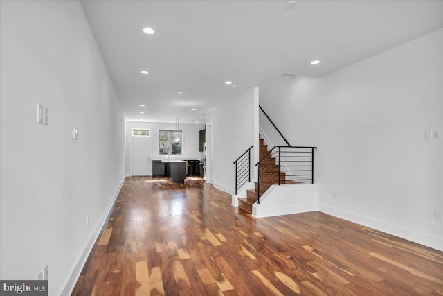 interior space with dark hardwood / wood-style floors