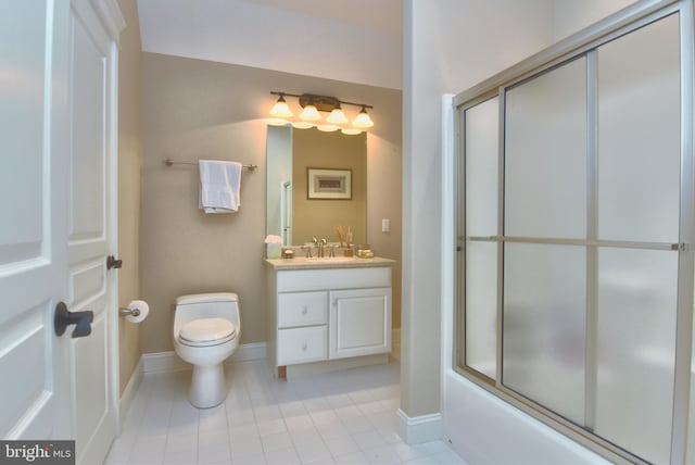 full bathroom featuring tile patterned floors, enclosed tub / shower combo, vanity, and toilet