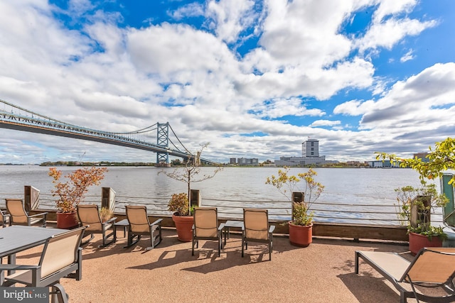 view of patio featuring a water view