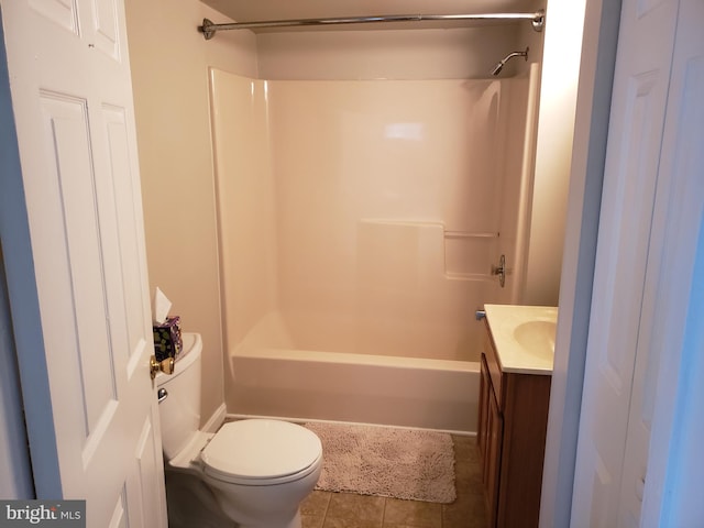 full bathroom with tub / shower combination, vanity, tile patterned flooring, and toilet