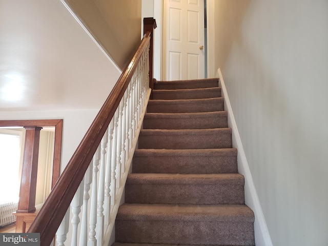 staircase with radiator