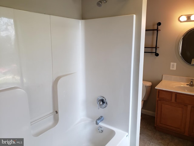 full bathroom featuring vanity, tile patterned flooring, toilet, and shower / bathtub combination