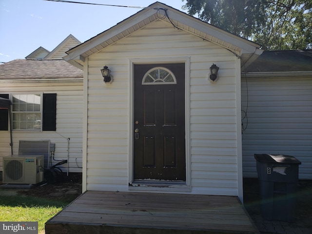 property entrance featuring ac unit