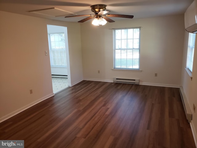 unfurnished room with dark hardwood / wood-style floors, ceiling fan, and a baseboard radiator